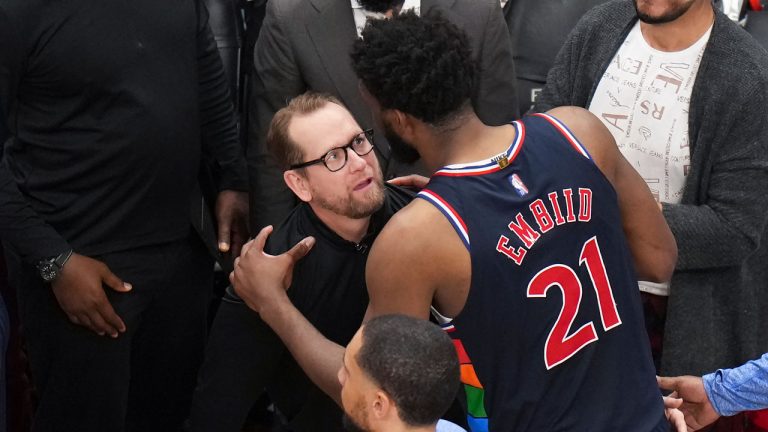 Toronto Raptors head coach Nick Nurse, left, congratulates Philadelphia 76ers centre Joel Embiid (21) on winning the series after NBA round one playoff basketball action. (Nathan Denette/CP)