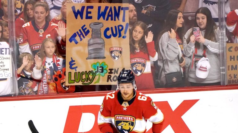 Florida Panthers fans hold a sign about the Stanley Cup before an NHL hockey game between the Panthers and the Toronto Maple Leafs, Saturday, April 23, 2022, in Sunrise, Fla. (Lynne Sladky/AP Photo)