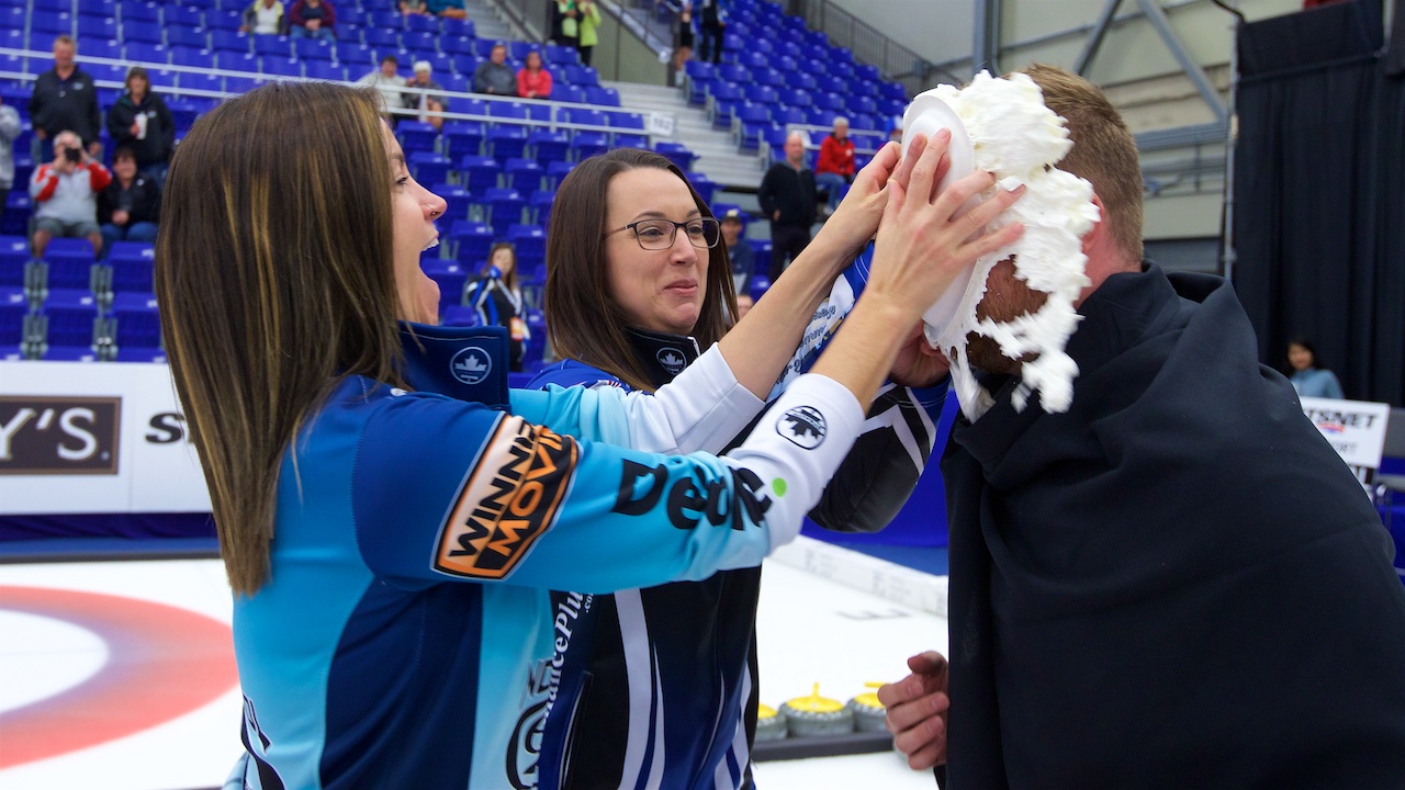 Flashback: Rory McCusker (right) takes a pie in the face from Kerri Einarson (left) and Val Sweeting (centre) during the finals of the Tour Challenge in Regina on Sept. 10, 2017. (Anil Mungal/GSOC)