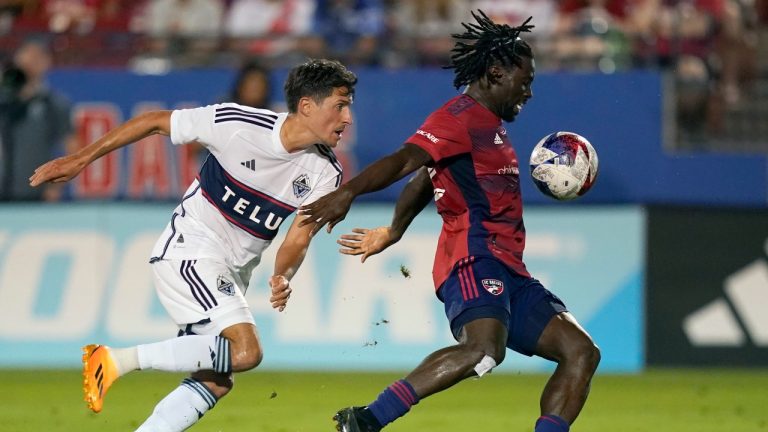 FC Dallas midfielder Ema Twumasi, right, controls the ball in front of Vancouver Whitecaps midfielder Alessandro Schöpf during the second half of an MLS soccer match Wednesday, May 17, 2023, in Frisco, Texas. (LM Otero/AP Photo)