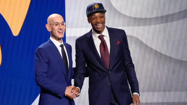 Bilal Coulibaly poses for a photo with NBA Commissioner Adam Silver after being selected seventh overall by the Indiana Pacers during the NBA basketball draft, Thursday, June 22, 2023, in New York. (John Minchillo/AP Photo)