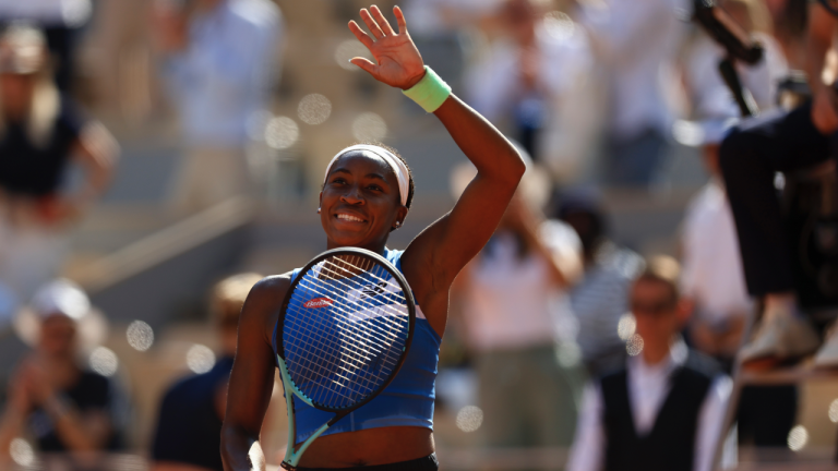 Coco Gauff of the U.S. celebrates winning her fourth round match of the French Open tennis tournament against Slovakia's Anna Karolina Schmiedlova at the Roland Garros stadium in Paris, Monday, June 5, 2023. (AP Photo/Aurelien Morissard)