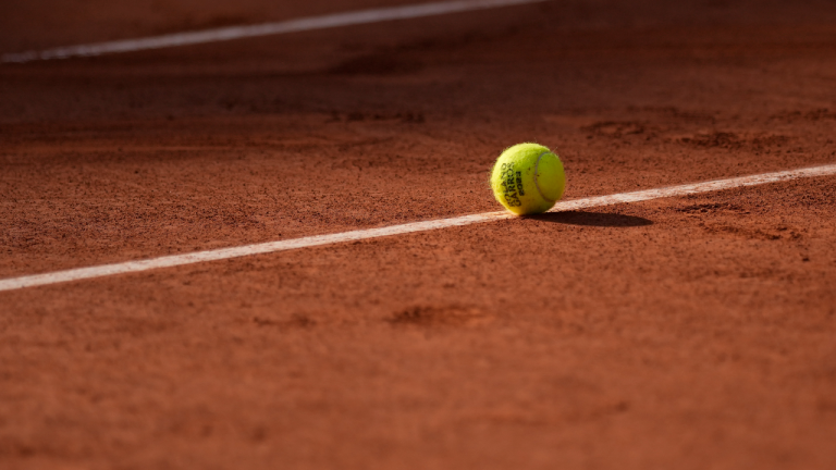 A ball lays on the court during a quarterfinal match of the French Open tennis tournament at the Roland Garros stadium in Paris, Tuesday, June 6, 2023. (AP)