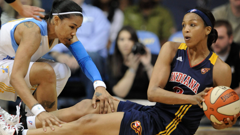 Indiana Fever's Tammy Sutton-Brown right, battles Chicago Sky's Tamera Young left, for a lose ball during the third quarter of a WNBA basketball game in Rosemont, Ill., Sunday, Sept. 4, 2011. (AP)