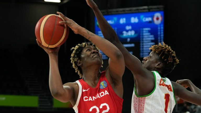 Canada's Phillipina Kyei, left, shoots over Mali's Kankou Coulibaly during their game at the women's Basketball World Cup. (Rick Rycroft/AP)