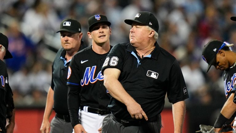 Umpire Bill Miller, right, ejects New York Mets relief pitcher Drew Smith, center, during the seventh inning of a baseball game against the New York Yankees Tuesday, June 13, 2023, in New York. (Frank Franklin II/AP)
