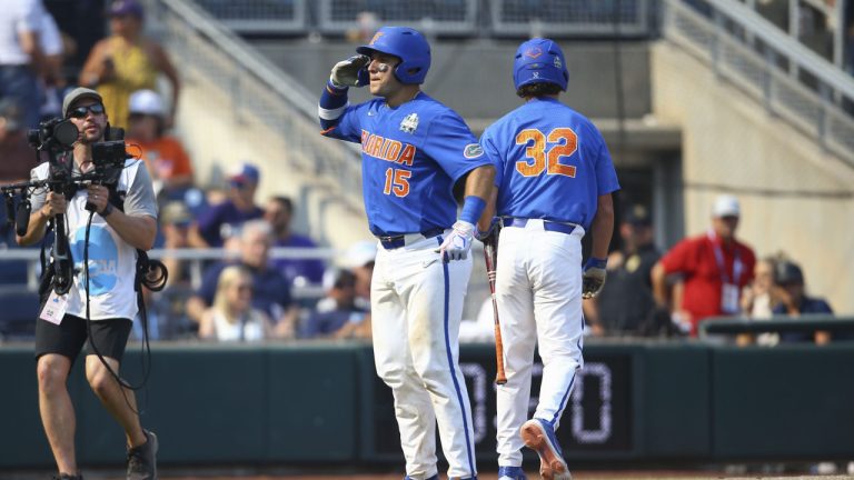 Florida's BT Riopelle (15) reacts after hitting a home run during the ninth inning of Game 2 of the NCAA College World Series baseball finals against LSU in Omaha, Neb., Sunday, June 25, 2023. (AP Photo/John Peterson)