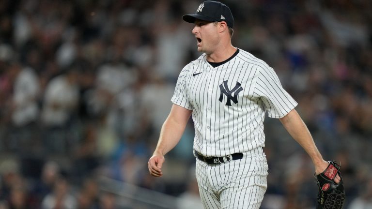 New York Yankees starting pitcher Gerrit Cole yells towards home plate after retiring the side in the seventh inning of a baseball game against the Seattle Mariners, Tuesday, June 20, 2023, in New York. (John Minchillo/AP)