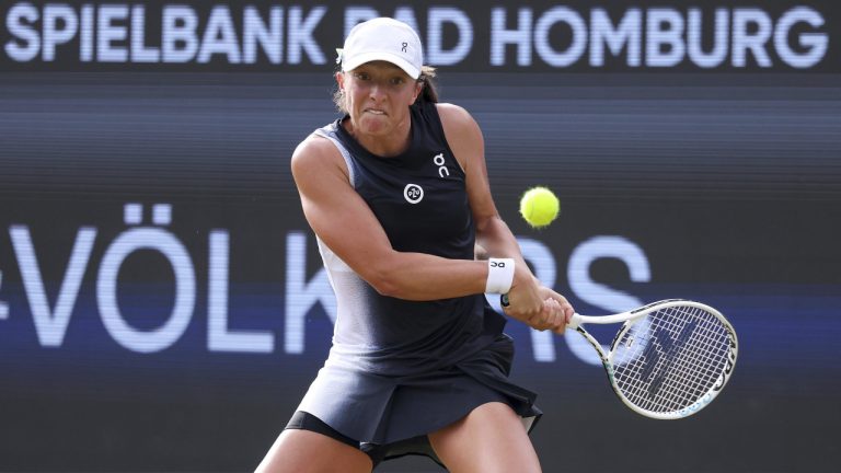 Poland's Iga Swiatek plays a shot against Russia's Anna Blinkova during their quarterfinal WTA tour tennis match in Bad Homburg, Germany, Thursday, June 29, 2023. (Joaquim Ferreira/dpa via AP)