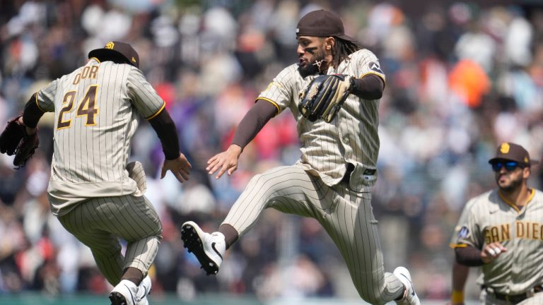 San Diego Padres' Rougned Odor (24) celebrates with Fernando Tatis Jr. after the Padres defeated the San Francisco Giants in a baseball game in San Francisco, Thursday, June 22, 2023. (Jeff Chiu/AP)
