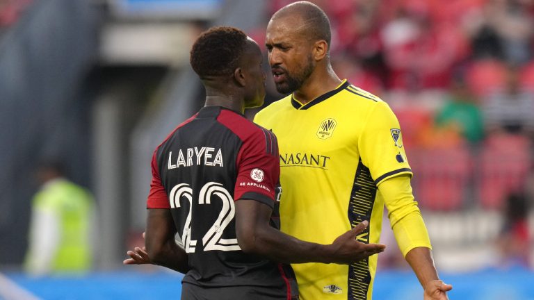 Toronto FC's Richie Laryea squares up to Nashville SC's Teal Bunbury during first half MLS action in Toronto, on Saturday, June 10, 2023. (Chris Young/CP)