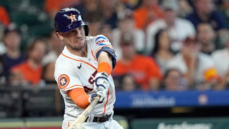 Houston Astros' Alex Bregman hits an RBI single against the New York Mets during the fourth inning of a baseball game Wednesday, June 21, 2023, in Houston. (David J. Phillip/AP Photo)