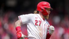 Reds extend win streak to 11 with dramatic victory over Rockies