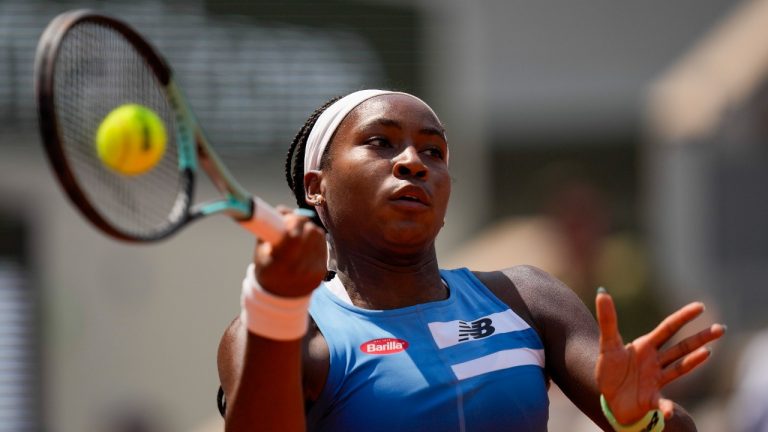 Coco Gauff of the U.S. plays a shot against Poland's Iga Swiatek during their quarterfinal match of the French Open tennis tournament at the Roland Garros stadium in Paris, Wednesday, June 7, 2023. (Thibault Camus/AP)