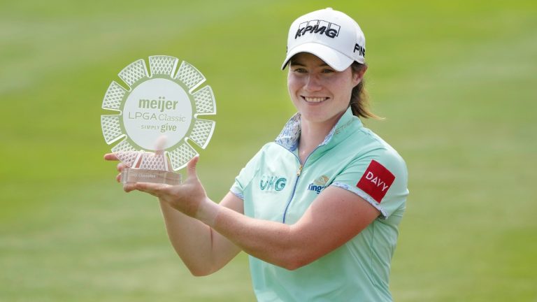 Leona Maguire holds the winner's trophy after the final round of the Meijer LPGA Classic golf tournament at Blythefield Country Club, Sunday, June 18, 2023, in Belmont, Mich. (Carlos Osorio/AP)