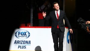Former Arizona Coyotes hockey captain Shane Doan waves to fans as he arrives during his jersey retirement ceremony prior to an NHL hockey game against theWinnipeg Jets Sunday, Feb. 24, 2019, in Glendale, Ariz. (Ross D. Franklin/AP)