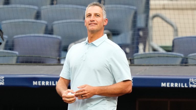 Former New York Yankees pitcher Andy Pettitte walks on the field to throw out a ceremonial first pitch before a baseball game between the Yankees and the New York Mets, Tuesday, July 25, 2023, in New York. (Frank Franklin II/AP)