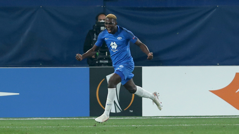 Molde's David Datro Fofana celebrates scoring his side's third goal to make the score 3-3 during the Europa League round of 32 first leg soccer match between Molde and 1899 Hoffenheim at the Ceramica stadium in Villarreal, Spain, Feb. 18, 2021 (AP)