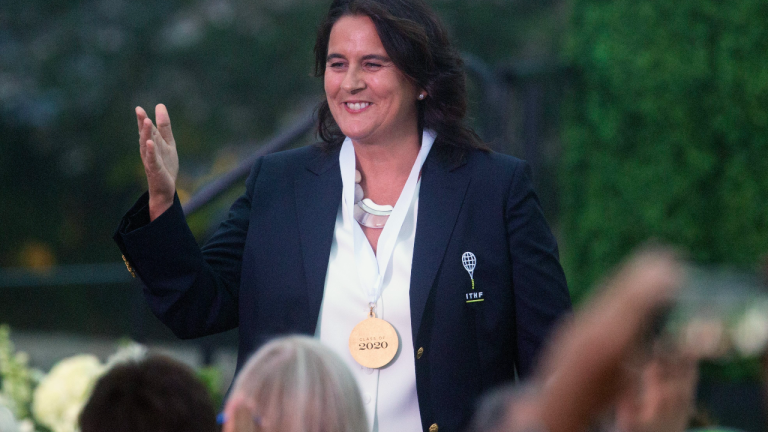 Conchita Martinez waves to the crowd after being inducted into the International Tennis Hall of Fame, Saturday, July 17, 2021, in Newport, R.I. (AP)