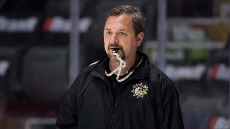 Hamilton Bulldogs head coach John Gruden watches his team practice at the Memorial Cup in Regina, Sask., Thursday, May 24, 2018.(CP)