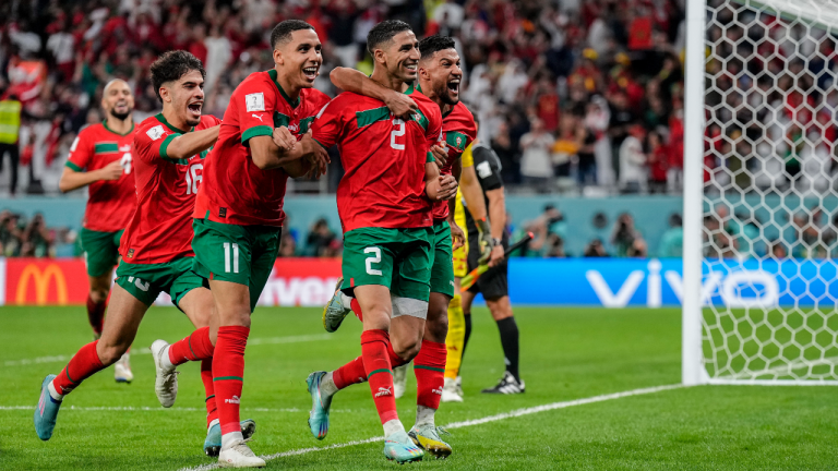 FILE - Morocco's players celebrate their victory over Spain during the World Cup round of 16 soccer match between Morocco and Spain, at the Education City Stadium in Al Rayyan, Qatar, on Dec. 6, 2022. Nigeria and South Africa were drawn in the same World Cup qualifying group on Thursday July 13, 2023 in a re-shaped African competition that will lead to at least nine teams at the 2026 showpiece in the U.S., Canada and Mexico. (AP Photo/Martin Meissner, File)