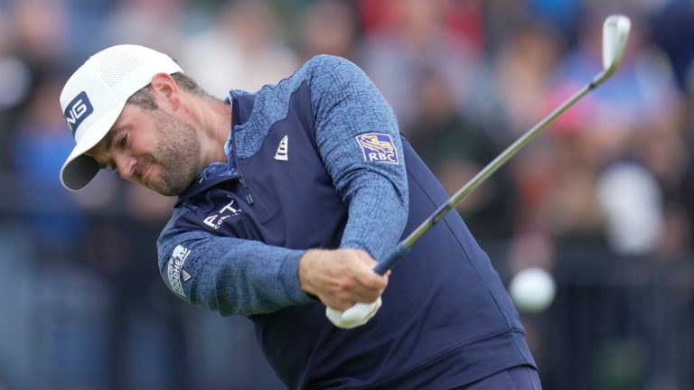 Canada's Corey Conners play his tee shot on the fourth hole during the third day of the Open Championship at the Royal Liverpool Golf Club in Hoylake, England, Saturday, July 22, 2023. (Kin Cheung/AP)