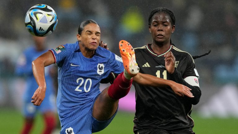 France's Estelle Cascarino, left, and Jamaica's Khadija Shaw battle for the ball during the Women's World Cup Group F soccer match between France and Jamaica at the Sydney Football Stadium in Sydney, Australia, Sunday, July 23, 2023. (Mark Baker/AP)