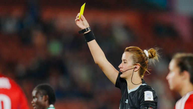 Referee Bouchra Karboubi shows a yellow card to Costa Rica's Katherine Alvarado, not pictured, during the Women's World Cup Group C soccer match between Costa Rica and Zambia in Hamilton, New Zealand, Monday, July 31, 2023. (AP)