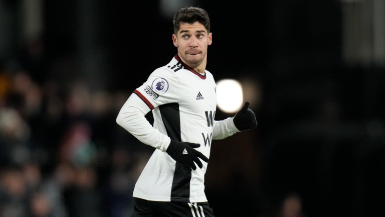 Fulham's Manor Solomon celebrates after scoring during the English Premier League soccer match between Fulham and Wolverhampton Wanderers at Craven Cottage stadium in London, Friday, Feb. 24, 2023. (AP)