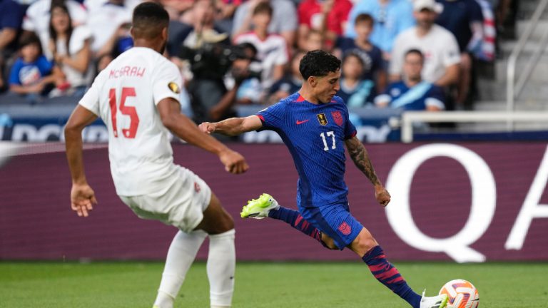 United States forward Alejandro Zendejas (17) advances the ball against Canada defender Zac McGraw (15) during a CONCACAF Gold Cup soccer match, Sunday, July 9, 2023, in Cincinnati. (Michael Conroy/AP)