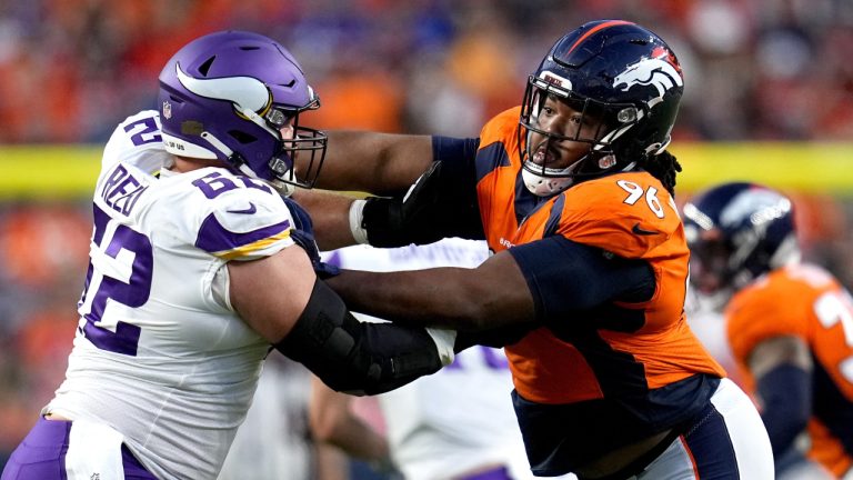Denver Broncos defensive end Eyioma Uwazurike (96) battles Minnesota Vikings guard Chris Reed (62) during the first half of an NFL preseason football game, Saturday, Aug. 27, 2022, in Denver. (Jack Dempsey/AP)