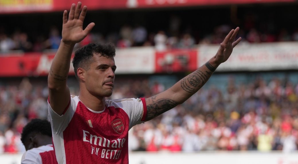 Bayer Leverkusen signs Switzerland midfielder Granit Xhaka from Arsenal