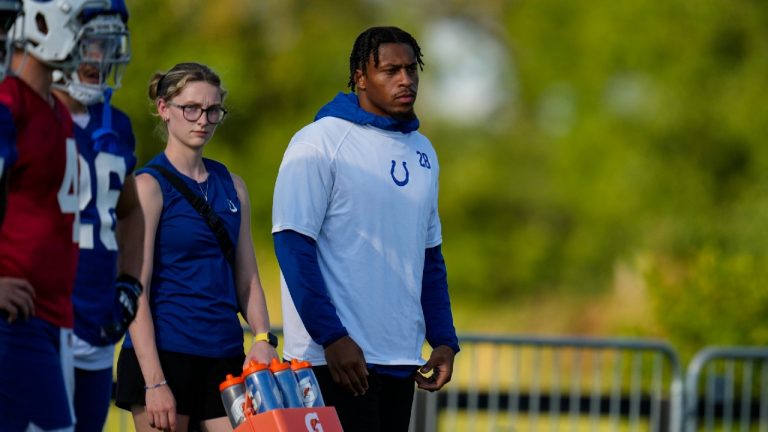 Indianapolis Colts running back Jonathan Taylor watches practice at NFL team's football training camp in Westfield, Ind., Saturday, July 29, 2023. (AP)