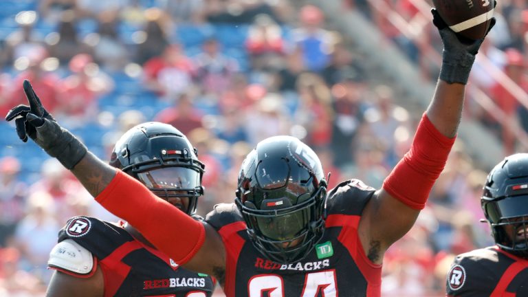 Ottawa Redblacks' Lorenzo Mauldin celebrates an interception against the Calgary Stampeders during first half CFL football action in Calgary, Alta., Sunday, July 23, 2023. (Larry MacDougal/CP)