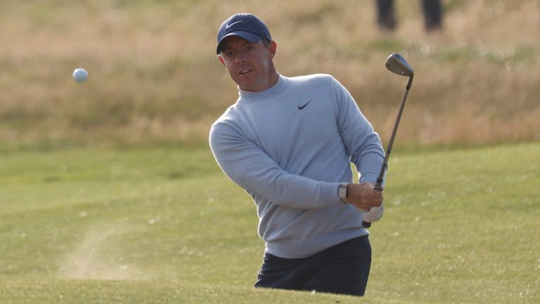 Northern Ireland's Rory McIlroy played out of a bunker on the 15th hole on the first day of the British Open Golf Championships at the Royal Liverpool Golf Club in Hoylake, England, Thursday, July 20, 2023. (Peter Morrison/AP)