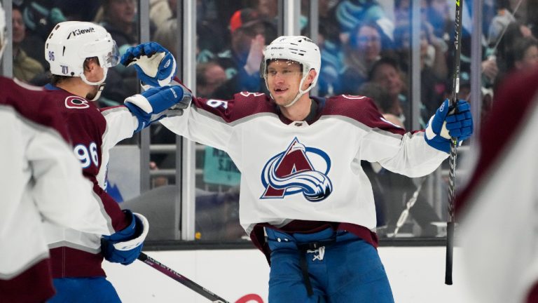 Colorado Avalanche defenseman Erik Johnson (6) celebrates his goal against the Seattle Kraken with teammate Mikko Rantanen (96) during the second period of Game 6 of an NHL hockey Stanley Cup first-round playoff series Friday, April 28, 2023, in Seattle. (Lindsey Wasson/AP)