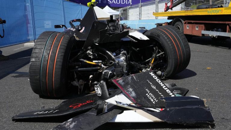 The crashed Jaguar of Britain's Sam Bird is seen in front of the Square Colosseum of the EUR district during the race one of the Rome E-Prix in Rome. (Gregorio Borgia/AP)
