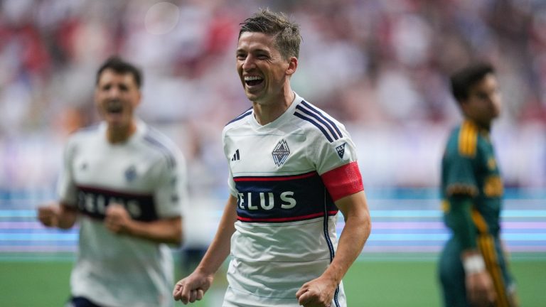Vancouver Whitecaps' Ryan Gauld celebrates his first goal against the Los Angeles Galaxy during the first half of an MLS soccer match in Vancouver, B.C., Saturday, July 15, 2023. (Darryl Dyck/CP)