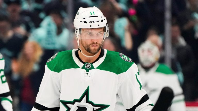 Dallas Stars center Luke Glendening (11) looks on against the Seattle Kraken during the second period of Game 3 of an NHL hockey Stanley Cup second-round playoff series Sunday, May 7, 2023, in Seattle. (Lindsey Wasson/AP)
