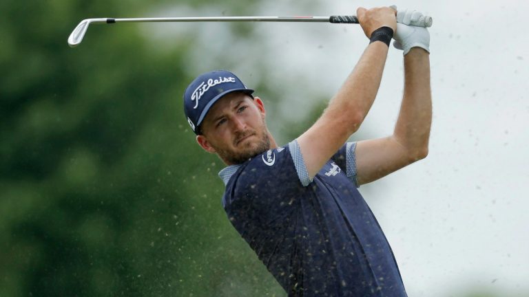 Lee Hodges tees watches his tee shot on the fourth hole during the second round of the 3M Open golf tournament at Tournament Players Club on Friday, July 28, 2023, in Blaine, Minn. (Bruce Kluckhohn/AP)