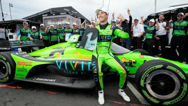 Christian Lundgaard celebrates with his Rahal Letterman Lanigan Racing teammates after winning the pole position for the 2023 Honda Indy Toronto in Toronto on Saturday, July 15, 2023. (Frank Gunn/THE CANADIAN PRESS)