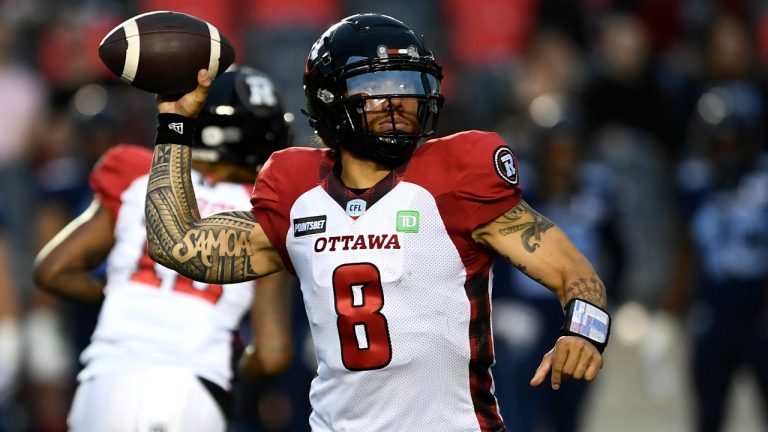Ottawa Redblacks quarterback Jeremiah Masoli (8) throws the ball during first half of preseason CFL football action against the Toronto Argonauts in Ottawa on Friday, May 27, 2022. (Justin Tang/CP)