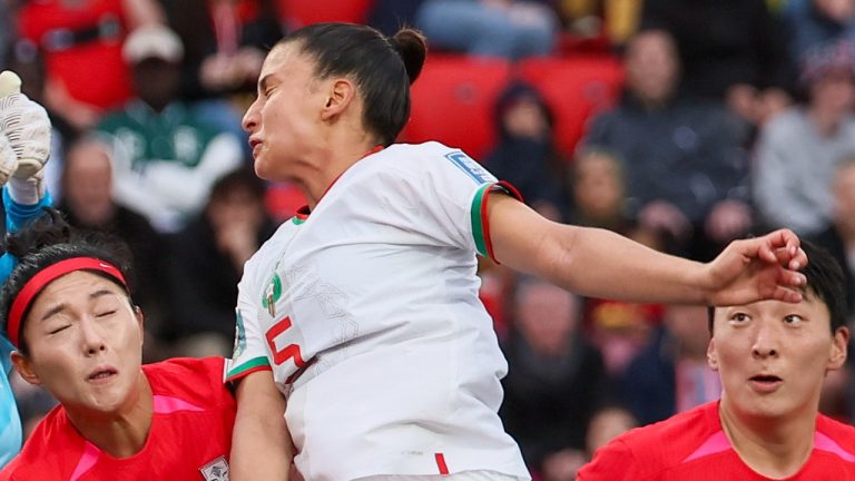 South Korea's goalkeeper Kim Jung-mi, left, punches the bal clear of Morocco's Nesryne El Chad during the Women's World Cup Group H soccer match between South Korea and Morocco in Adelaide, Australia, Sunday, July 30, 2023. (James Elsby/AP Photo)