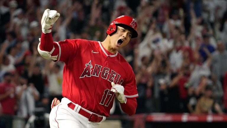 Los Angeles Angels' Shohei Ohtani celebrates as he rounds first after hitting a two-run home run during the seventh inning of a baseball game against the New York Yankees Monday, July 17, 2023, in Anaheim, Calif. (AP Photo)