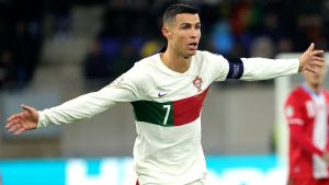 Portugal's Cristiano Ronaldo, centre, in action during the Euro 2024 group J qualifying soccer match between Luxembourg and Portugal at the Stade de Luxembourg in Luxembourg, Sunday, March 26, 2023. (Olivier Matthys/AP)