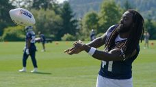 Former Seahawks, Ravens running back Alex Collins killed in motorcycle crash
