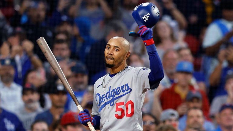Los Angeles Dodgers' Mookie Betts tips his helmet as he comes up to bat against the Boston Red Sox during the first inning of baseball game Friday, Aug. 25, 2023, in Boston. (Michael Dwyer/AP Photo)