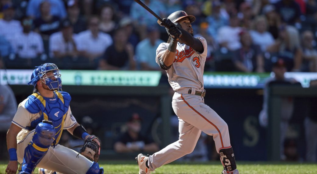 Mullins robs homer in 9th, hits 2-run shot in 10th to help Orioles top Mariners