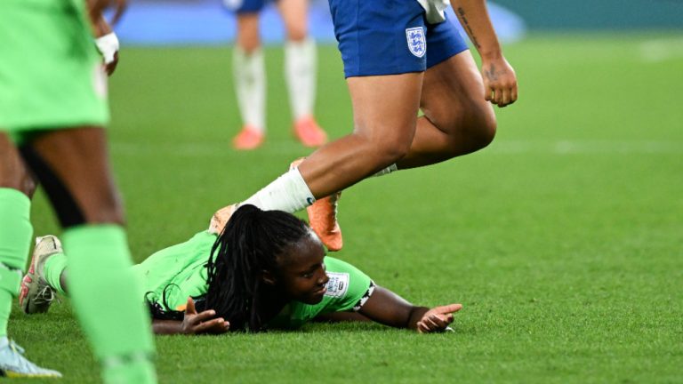 Lauren James of England steps on Michelle Alozie of Nigeria during the Women's World Cup round of 16 soccer match between England and Nigeria in Brisbane, Monday, Aug. 7, 2023. (Darren England/AAP Image via AP)
