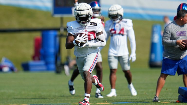 New York Giants running back Eric Gray (20) runs during an NFL football practice in Allen Park, Mich., Wednesday, Aug. 9, 2023. (AP)